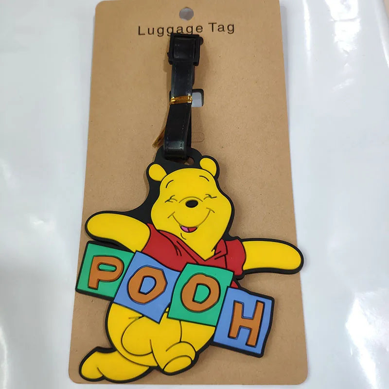 تاق شنطة سفر بتصميم ويني ذا بوه – لطيف ومميز مع حامل معلومات الاسم والعنوان