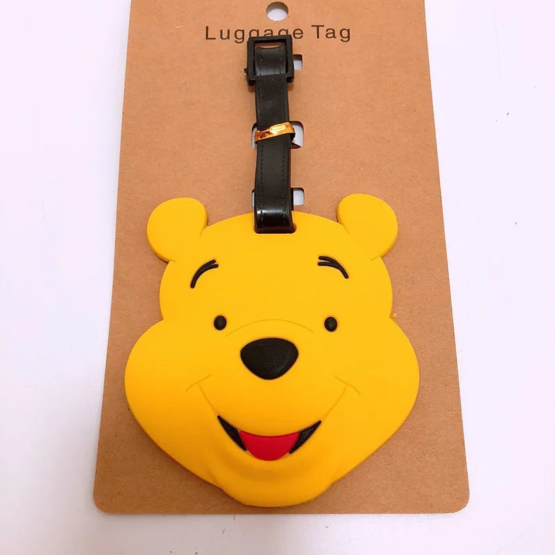 تاق شنطة سفر بتصميم ويني ذا بوه – لطيف ومميز مع حامل معلومات الاسم والعنوان