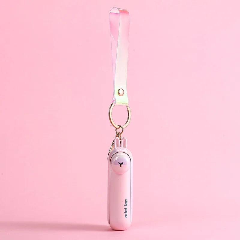 مروحة صغيرة محمولة USB – تصميم كيوت قابل للطي | تبريد للمكتب، السرير أو أثناء التنقل – بطارية قابلة للشحن