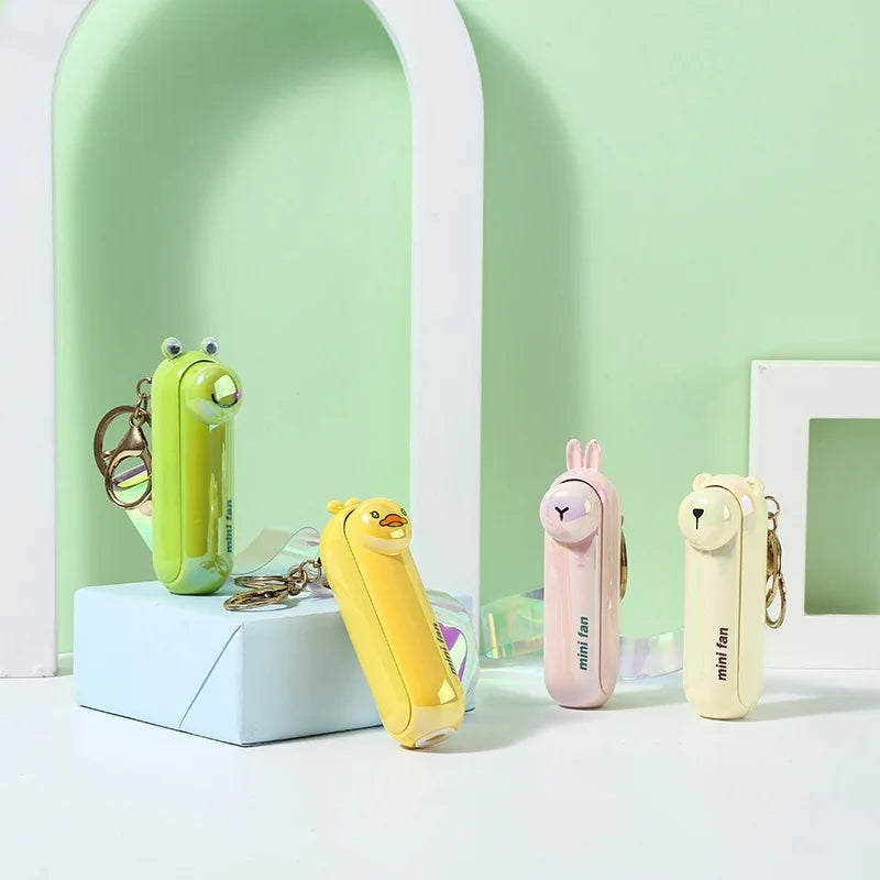 مروحة صغيرة محمولة USB – تصميم كيوت قابل للطي | تبريد للمكتب، السرير أو أثناء التنقل – بطارية قابلة للشحن