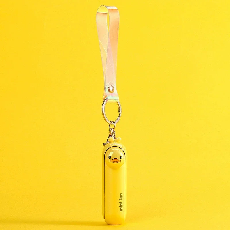 مروحة صغيرة محمولة USB – تصميم كيوت قابل للطي | تبريد للمكتب، السرير أو أثناء التنقل – بطارية قابلة للشحن