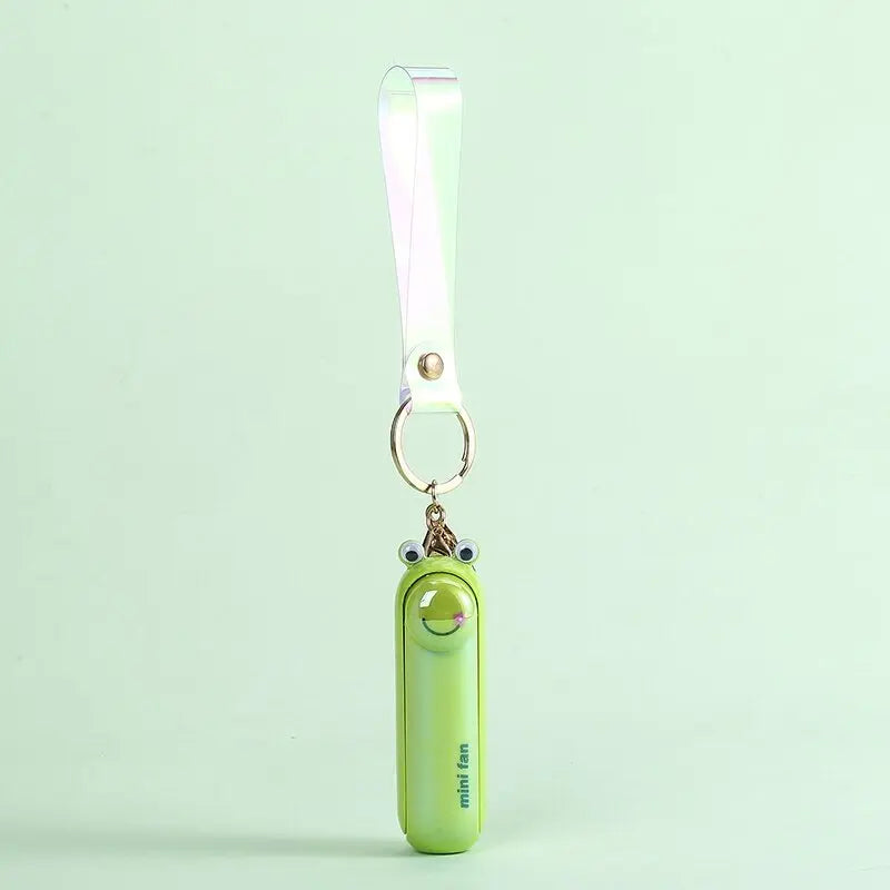 مروحة صغيرة محمولة USB – تصميم كيوت قابل للطي | تبريد للمكتب، السرير أو أثناء التنقل – بطارية قابلة للشحن